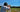 man shooting skeet with shotgun